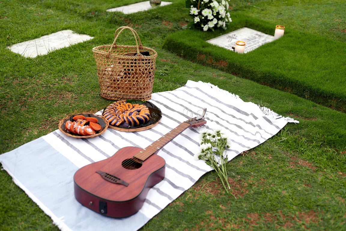 Picnic Near a Tombstone